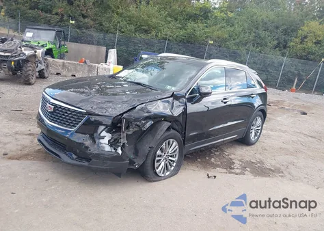 2024 Cadillac Xt4 Awd Premium Luxury from USA, damaged, VIN 1GYFZDR47RF151497